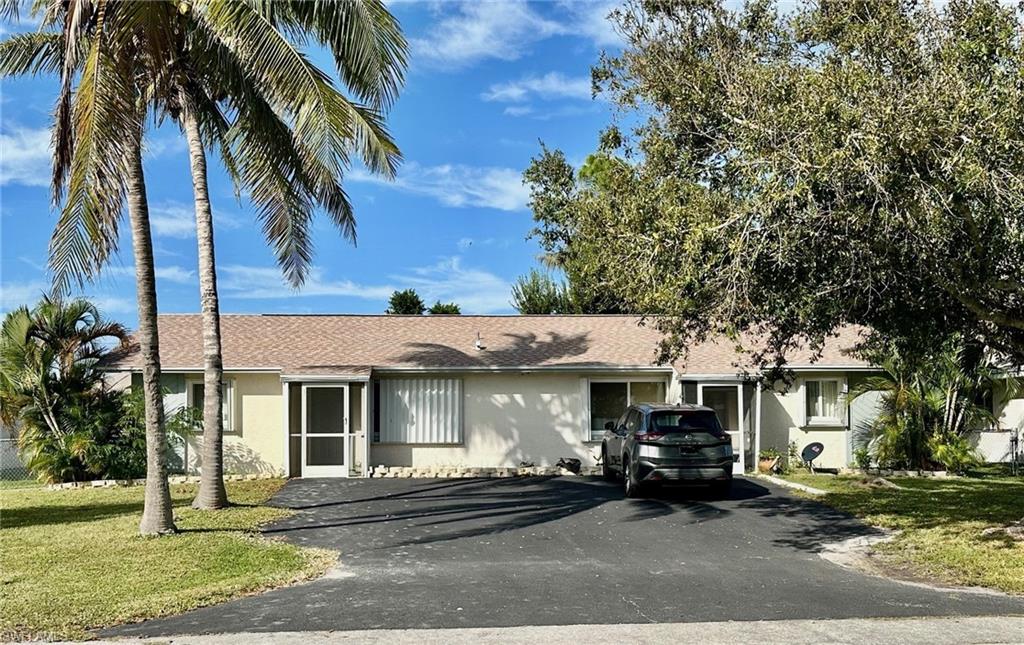 New roof; New windows! BEST VALUE on a duplex in SE Cape Coral! OUTSTANDING addition to your investment portfolio! Updated, well-maintained duplex IDEALLY LOCATED in the heart of Cape Coral near LOTS of shopping, schools, health care, parks, library & entertainment. No shortage of restaurants - fast food to fine dining. For a day of family fun, Sun Splash Family Water Park and Gator Mike's Family Fun Park are less than 10 mins away, and for golfers and beach goers, there are 31 golf courses & 4 sugar-sand beaches less than an hour away! NEW ROOF in May 2023! A/C units are about 5 years old & regularly serviced. Each side features 2 Bedrooms /1 Bathroom with shower/tub combo; granite counters. Tile and brand new laminate flooring (no carpet). Each side has a Fenced back yard. City water, sewer, & irrigation. Not in a flood zone. Tenant in Unit A has a lease thru 12/31/23. Unit B is vacant. Plan NOW for your retirement income stream before this one gets away!