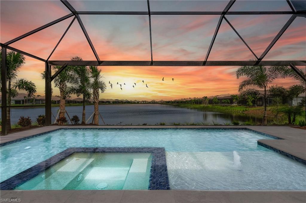 JUST COMPLETED 2022 Isles of Collier Preserve never lived in coastal luxury home. Breathtaking LONG LAKE VIEWS with a western orientation for the perfect SUNSET night after night. White sand beaches. SERENA AND LILY lighting throughout. Great room with shiplap, custom ceilings. Large master suite on first floor plus two suites down or offices. Game/Media room upstairs with a VIP Suite and balcony. 3-Car garage. summer kitchen FEMA Zone X Shaded. WARRANTY with Minto. Enormous laundry room. PET relief area under cage. The best SOCIAL community, ultra LOW HOA fees. LOCK & LEAVE, your yard & irrigation are included. Luxurious Old Key West Clubhouse with enormous gym and large resort pool. Organized PICKLEBALL, exercise, yoga & tennis, kayaks & paddleboards with ramp onto wide water & mangroves out to the gulf, indoor basketball, lane pool, miles of walking & biking trails, nature trails, & bocce. SOCIAL activities and classes abound! Restaurant over the water with music on the weekends and special holidays. Hamilton Harbor & Windstar Golf nearby. Minutes to DOWNTOWN 5TH AVE. Designer furnishings available for rent or purchase from Meredith Baer.