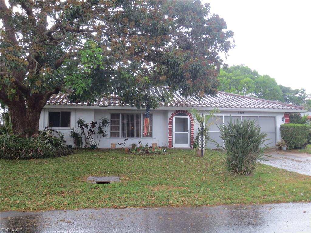 Enjoy living in this lovely home in the CAPE CORAL YACHT CLUB  neighborhood and enjoy the following amenities: Clean/Beautiful Beach, Fish from the New Pier, Olympic Size Pool, Tennis Courts, Shelters & Grills, Playground equipment right on the beach, Boat Ramp, Dock your boat at the Yacht Club, Lunch at the Boat House all this within walking distance from your home. Home has had been upgraded with New tile roof 2009, Hot Water Tank 2011, A/C 2012,  New A/C Ducts 2010, AGDO/ 2 remotes and a wall mount key less entry and screening covers garage door opening. Sprinklers are on the well. Well has New Pump 2015. Work bench in garage. Lanai is approximately 22' x 25' and screen enclosed. Plenty of room to add a pool. Priced for a quick sale,  you need to see this home NOW!