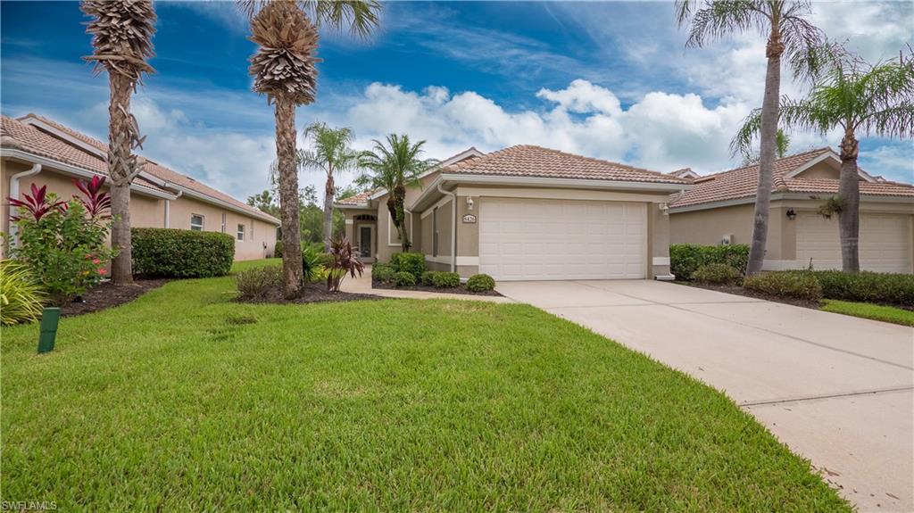 Beautiful single family "patio home" in the Langshire Community at the Legends Golf and Country Club.  Open concept kitchen, living room and dining room.  Kitchen has Corian counter tops and updated stainless steel appliances.  New A/C was installed in 2020 & Crown molding throughout..  This home has 2 bedrooms and 2 baths and a spacious den with French doors that can be used as an office or extra bedroom.  Master bedroom has an ensuite bathroom with double sinks, walk-in shower and a large walk-in closet. The lanai has acrylic sliders for all weather enjoyment.  The lanai and 2 sliding patio doors have custom made blinds.  Enjoy the Langshire pool just steps from your home.  Legends Golf and Country Club has many amenities that include a beautiful clubhouse with  a large dining room, pub and a new outside open air restaurant.  There is a large community pool and spa, bocce courts, tennis courts, and pickle ball courts for your enjoyment.  This home is a Social Membership - no golf fees.  All this and a 2 car garage! Legends offers 24/7 security, 3 restaurants, resort style pools, tennis, pickle ball, bocee ball, fitness center, tons of activities including dances and concerts. The social membership also includes cable TV and internet service. Legends has no city taxes and no C.D.D.