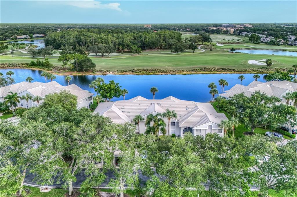 Treasure found! Highly desired floor plan that lives like a home. Located in the prestigious Vineyards Country Club community of Bellerive. Spacious 3 bedrooms with over 1700+ SF of living area. Very peaceful setting, no road noise, yet close-in to all Naples has to offer; shopping, fine dining, theater and restaurants. Easy access to I-75. 
This gorgeous residence has long lake views overlooking the beautiful greens of the golf course. This home is in excellent shape and move-in condition. Solid flooring throughout. Short walk to the community pool with spa. Vineyards Country Club offers different levels of memberships; 36 holes Championship Golf, Tennis/Pickleball, Spa & Wellness Center and Club Dining. It has something for everyone! Within the community, you will find Publix, Walgreens, banks, dry cleaners, veterinary services, multiple restaurants, and Physicians Regional Hospital. This one has it all at an attractive price-point. (Professional photos coming soon)
