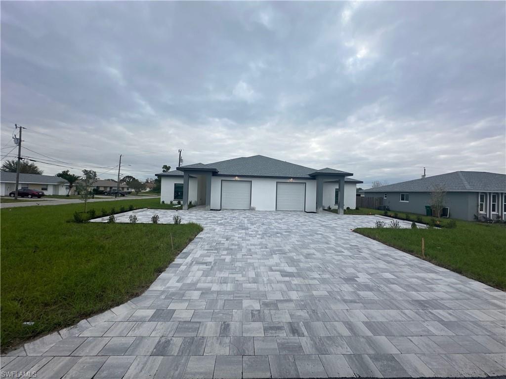 Welcome to a fully leased, cash-flowing duplex on a desirable corner lot in Cape Coral, now offering a rare 3.75% interest rate buydown for qualified buyers. This turnkey property is generating over $1,000 in monthly cash flow with both sides occupied by quality tenants, delivering immediate returns with zero vacancy concerns. Built in 2024, each side offers 1,237 square feet of living space with 3 bedrooms, 2 full bathrooms, and an attached 1-car garage. The corner lot location provides enhanced curb appeal, extra yard space, and better natural light, making these units highly desirable to current and future tenants. With both sides already leased and generating strong cash flow, this property offers true passive income from day one. As newer construction, you'll benefit from minimal maintenance needs and years of reliable performance ahead. This is your opportunity to acquire a turnkey, cash-flowing investment with quality tenants in place and financing that makes the numbers work beautifully. Perfect for 1031 exchange buyers, portfolio builders, or first-time investors.