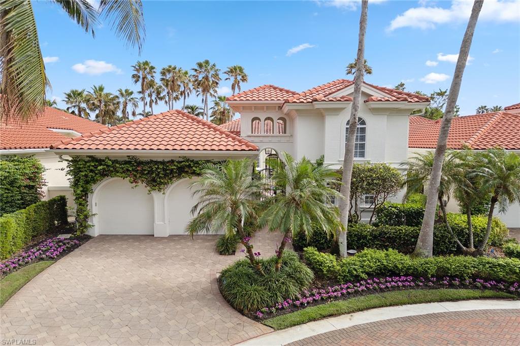 Exceptional designer style and charm with a premier Bay Colony address! This charming gated courtyard home features exquisite decor and design lovingly crafted by renowned Chicago-based design firm Megan Winters Interiors. Upgrades include wide plank wood flooring with oversized base trim and moldings, shiplap accents, tasteful wall and window coverings, a masterful chef's kitchen with Sub-Zero refrigeration, Wolf cook top and double oven, Carrera marble countertops, large center island, elegant Levant cabinetry, and oversized storage and pantry space. Tons of natural light illuminate the well-appointed office and outdoor dining spaces. The primary suite welcomes you into an oversized spa-like experience with a barrel ceiling, separate shower and  tub, dual vanities and incredible dressing room walk-in closet with custom built-ins. Guests enjoy privacy and comfort in the well-equipped and playfully designed poolside cabana with breakfast bar, full bath and built-in double queen bunks and Murphy bed. Bay Colony residents enjoy privacy of the Bay Colony Beach Club and newly constructed tennis club.