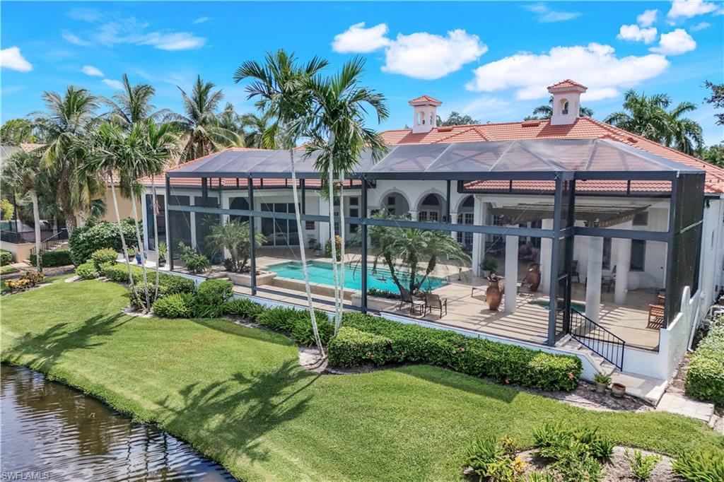 This exquisite estate home offers the ultimate in space, privacy and location! With a primary suite, four guest bedrooms, an office/den, a theater room, a formal living/dining area, an informal family/great room AND a separate cabana (fourth guest bedroom) offering a large en suite bedroom, a kitchenette and a HUGE air-conditioned, two story storage room, you will have enough space for everyone, friends and family alike. This home was designed for quintessential indoor/outdoor living with the primary suite, formal living space and the family/great room allowing lanai/pool access with unbelievable waterway/preserve views.  Located in the exclusive enclave of Bay Woods in Bonita Bay (country club membership optional), this home is a masterpiece, with soaring ceilings, marble floors, and lovely details throughout. This home offers sophisticated luxury and unparalleled seclusion with over 7,000+ square feet of living space under air + 3800 square feet of outdoor space! Imagine leisurely mornings, drinking coffee on your grand lanai or better yet - sipping evening cocktails while enjoying the sounds of nature as this is one of only a few homes in Bonita Bay with a completely private waterway and preserve view. Beyond the hustle & bustle, you will find true serenity within the walls of this home! Luxury features include marble flooring, volume ceilings, all bedrooms with en suite baths, beautifully renovated kitchen, dedicated wet bar in family room, formal living and dining with a gorgeous fireplace, plenty of covered lanai space, outdoor kitchen/walkup bar/dining area, custom pool/spa and so MUCH MORE! This home awaits its loving new owners! Bonita Bay is centrally located, just minutes to the airport! Bonita Bay amenities include a private beach club, kayaks, canoes, pickle ball, tennis, several community parks/public spaces, 12+ miles of walking/biking paths and a full-service marina/restaurant! There are FIVE golf courses, several restaurants, a state-of-the-art fitness center, tennis and so much more available with club membership (additional fees)! Bonita Bay is close to ALL that SWFL has to offer - world class dining/shopping, beaches, nature preserves, the burgeoning downtown Bonita Springs, downtown Naples and so much more! A very SHORT ten-minute drive to RSW International Airport! Whether you are searching for your winter retreat or a permanent residence, this home could very well be THE ONE!