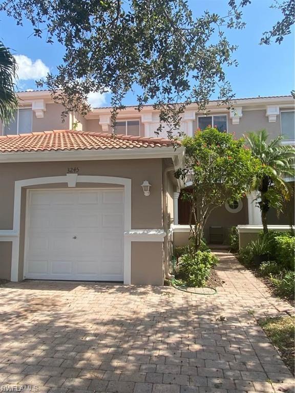 Stunning Lakefront Townhome in The Colonnade at The Forum! Discover the perfect blend of modern updates and Florida lifestyle in this beautifully maintained 3-bedroom, 2 1/2-bathroom townhome nestled in the highly sought-after gated community of The Colonnade at The Forum in Fort Myers. Step inside and be welcomed by a bright, open-concept living and dining area featuring vinyl plank flooring, a bold accent wall, and a dramatic black staircase that makes a lasting first impression. The spacious living room flows seamlessly to the dining area ideal for entertaining while a convenient half bath and powder room round out the main level. The kitchen offers ample cabinetry, full appliances including a Whirlpool refrigerator, electric range, built-in microwave, and stainless steel dishwasher all overlooking the main living space. Upstairs, retreat to the generous primary suite complete with an en-suite bath featuring dual sinks, a separate walk-in glass shower, a private water closet, and an expansive walk-in closet. Two additional bedrooms share a full bath, and the versatile loft space is perfect as a home office, playroom, or flex room. Step out back and enjoy breathtaking serene lake views from your screened lanai a true slice of paradise to start your mornings or unwind in the evenings. Key highlights: - Brand new roof — major investment already done for you - Water Treatment System for clean safe water - 2023 Water Heater - Beautiful lake views from the backyard - Located in a gated community with resort-style amenities: pool, fitness center, tennis courts, and playground. - Prime location off Colonial Blvd, just east of I-75 — minutes to shopping, dining, and everything Fort Myers has to offer This home checks every box. don't miss your chance to own in one of Fort Myers' most desirable communities!