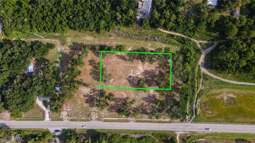 Welcome to one of the largest individual lots in this rare three-parcel opportunity along Mellow Dr in North Fort Myers. This 1.25-acre AG-2 zoned parcel (Rainbow Estates Unrec Blk C, Lot 13) is exceptionally clean for its size and offers true flexibility; zoning permits agricultural use, single-family residential, manufactured home, or mobile home placement. Whether you're looking to build your primary residence, establish a homestead, or hold as a land investment in a market with growing demand, this lot delivers. Direct road frontage on Mellow Dr ensures convenient access with no easement complications on this parcel. Bonus opportunity: This parcel is the center lot of three contiguous parcels available on Mellow Dr. Combine with 6030 & 6080 Mellow Dr (listed separately) to assemble a +/- 3.37-acre package, a compelling play for investors, small-scale developers, or buyers seeking room to grow. Each lot is available individually or as part of the full package. Parcel ID: 18-43-25-01-0000C.0130.
