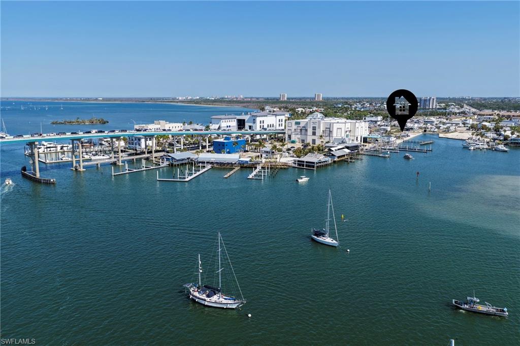 Location, location, location! Fort Myers Beach is just a walk over the bridge. This lot is located in Gulf Cove, a co-op community. This means you own 1/60th of the community. It is a 55+ waterfront community, the Board of Directors is working on a process for the boat slip assignments. Low HOA fees, only $800/quarter! Sewer, water, and electric for the community has been completed, and a newer electric power pedestal has already been installed for the lot. Highway ready RVs currently allowed on the lot through October 2027. Large lot with concrete pad allows enough space to accommodate a double wide trailer. New homes must be built to FEMA standards 8-10 feet above ground. Water, sewer, and electric available. Discover your new piece of paradise today!