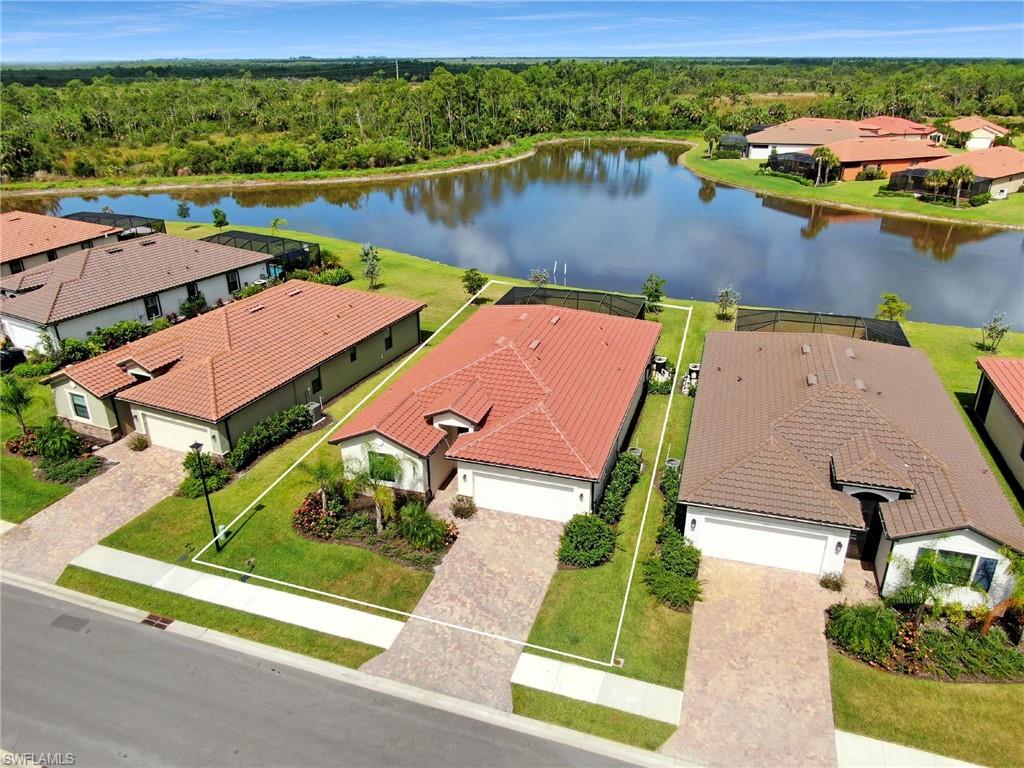 Discover this bright and airy coastal home perfectly nestled on a quiet cul-de-sac.  With highly sought after western exposure and expansive lake views, you can enjoy pristine sunsets while floating in your relaxing heated pool and spa.  This four bedroom three bathroom home has an open floor plan featuring a sublime master bedroom with water views and boasts a large en-suite with a separate shower and tub. The Artesia Clubhouse comes well equipped with many amenities such as a resort-style pool, pickleball, dog park and acres of untouched preserve. Located minutes from downtown Naples, Marco Island, chef-driven restaurants and endless shopping. Artesia has low HOA fees and no CDD.