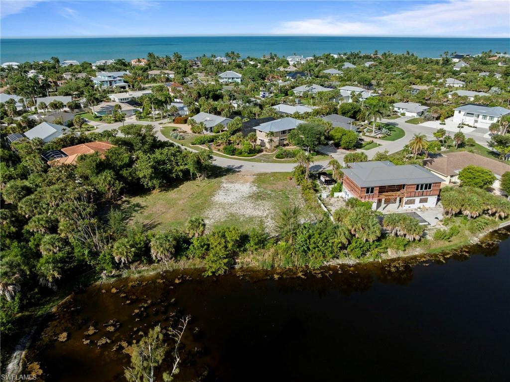 Build your dream island home on this exceptional vacant homesite located on a quiet cul-de-sac in one of Sanibel's most desirable neighborhoods. Situated within East Rocks, this lot offers a rare opportunity to create a custom residence in a peaceful setting surrounded by native vegetation and the natural beauty that makes Sanibel so special. Conveniently located near world-renowned beaches, bike paths, nature preserves, shopping, dining, and Sanibel's vibrant island amenities, this property provides the perfect balance of privacy and accessibility. Whether you're envisioning a seasonal retreat or a full-time residence, this prime homesite offers endless possibilities to design and build the island home you've always imagined. Neighboring property located at 564 Chert Ct. is also available for purchase.