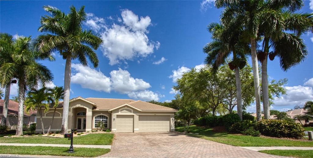 Newly renovated in 2019, this home has a European style flair in the golf and tennis community of Heritage Palms Country Club. Floor plan was completely opened up and reassembled with all new tile floors, baseboards, cabinets, vanities and paint. Stunning dining room with custom built wall of shelving and storage. Three bedrooms, each with its own bathroom. Master closet redesigned with floor to ceiling storage. Kitchen designed with ultra-modern cabinetry and pull out shelves, quartz leather finished waterfall counters with stair-step detail underneath, induction cook top and cookware, new built-in stainless Kitchen Aid appliances, sink and range hood. R/O filtration in the kitchen. All living areas have views of pool and private back yard. Freshly painted exterior, new landscaping, paved driveway and 3-car garage with racks for more storage. Manual hurricane shutters all around plus a hurricane proof front door. Heritage Palms is a unique community with TWO golf courses, active tennis club, pickle ball, bocce, fitness center and THREE restaurant venues, all bundled for an affordable resort lifestyle. See community tour!