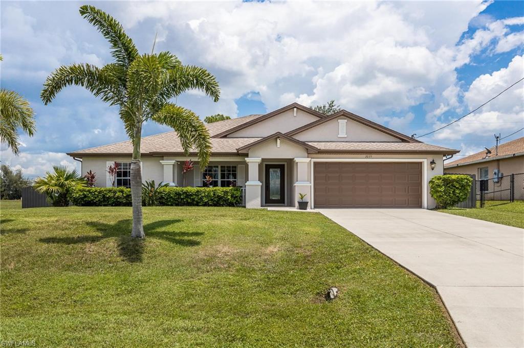 Immaculate 3 bedroom with DEN, 2.5 bath POOL home is on a cornet lot! Back yard has a 6 foot privacy fence. French doors to Den! Recently painted and  new Wood Laminate Flooring. It also offers a Spacious kitchen with Breakfast bar! VERY LARGE Master Bedroom with spacious walk-in closet, WALK-IN SHOWER, Separate Tub, and Dual Vanities! Large screened in lanai with an in-ground pool with outside pool-bathroom! Perfect for entertaining or just sitting outside to watch the sunset! Home has a kitchen sink reverse osmosis system, so you'll always have fresh water! Home is storm ready with Impact Resistant Windows! Irrigation System! This is truly a beautiful home that shows very well! Come check it out!