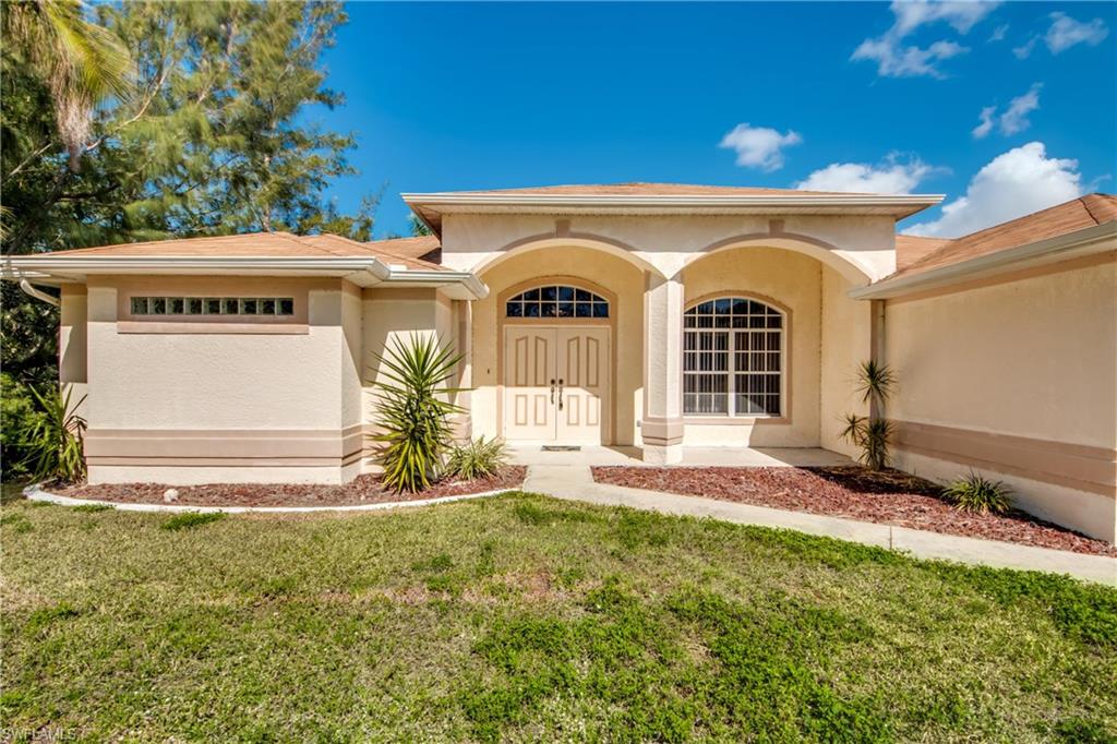 This 3/2/2 home has an open floor plan with sitting area and dining off of the open kitchen with a pantry.  Large backyard, landscaped for privacy, perfect for entertaining and plenty of room for a pool.  The master on suite features dual sinks in the  bath and a built-in safe in the large closet.  Located only 2 short blocks to the Burnt Store community boat ramp providing direct Gulf access.  Fall in love with this popular neighborhood in Unit 58, conveniently located to Veterans Pkwy, shopping, local artist shops and waterfront restaurants and charter schools.  Close to Matlacha, and Pine Island. Two Golf courses within blocks and two popular city parks, offering tennis, walking paths, exercise equipment and much more. Bicycle path nearby connects to popular tree lined path along Veterans Pkwy.   Easy access to I-75, Punta Gorda and Fort Myers airports.  SEE VIRTUAL TOUR !!!!!