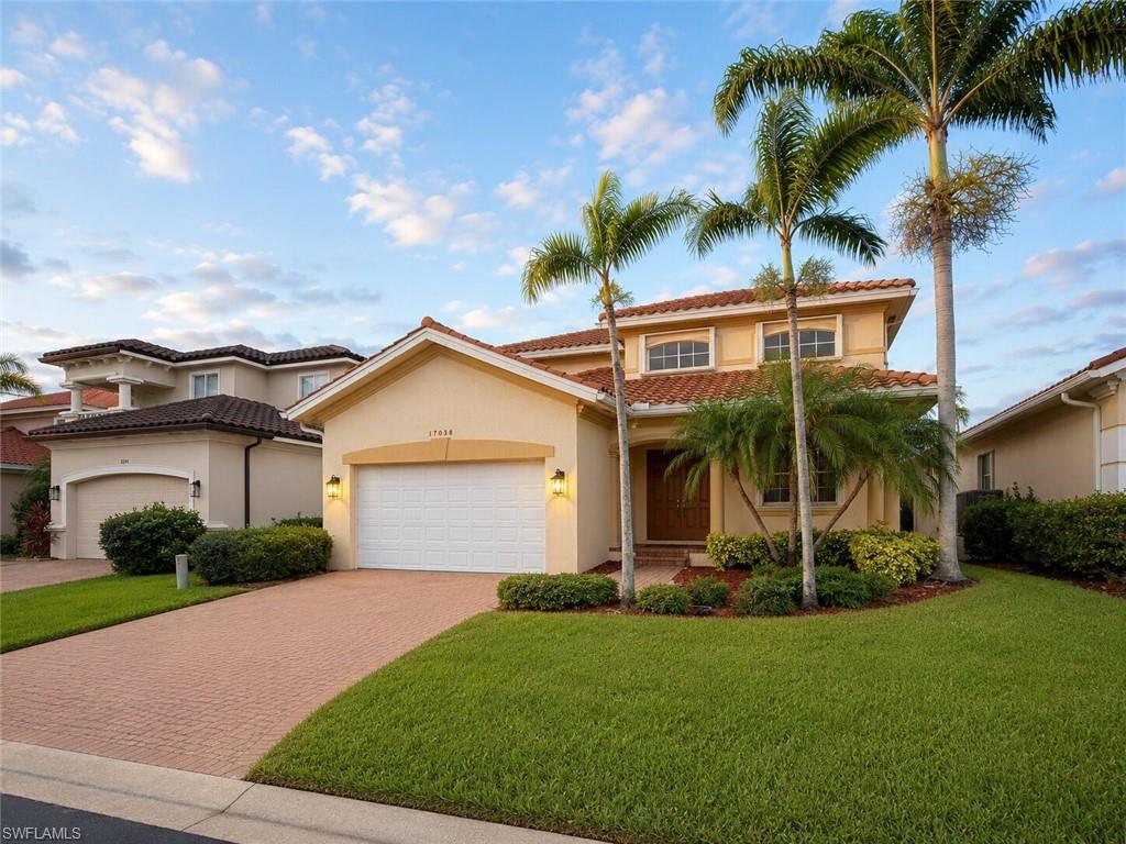 Stunning 2 story single family home available in the wonderful, gated community of Catalina Isles. Upon arrival you will be greeted by a beautiful open front porch and a grand entrance featuring two story ceilings, an open dining/family room, and lots of natural light. Tile is displayed throughout the entire lower level, including living/family rooms, kitchen/breakfast nook, owner's bedroom and bathroom as well as the laundry room and powder room. Owner's bedroom features dual closets and access to the private screened in lanai overlooking the lake. Owner's bathroom displays dual sinks, oversized walk-in shower, as well as a garden tub and private water closet. Upstairs is home to 3 guest rooms, a shared bathroom, extra storage closets and oversized loft. Property features an intercom system and central vacuum! Catalina Isles is located minutes from the beach, shopping, restaurants, hospitals, and schools. Catalina Isles has a community pool, playground, and fitness center. One small dog is allowed upon approval. If you are looking for a new home, set up a showing now!  (Please allow 30 days for applications to be processed- HOA approval REQUIRED)