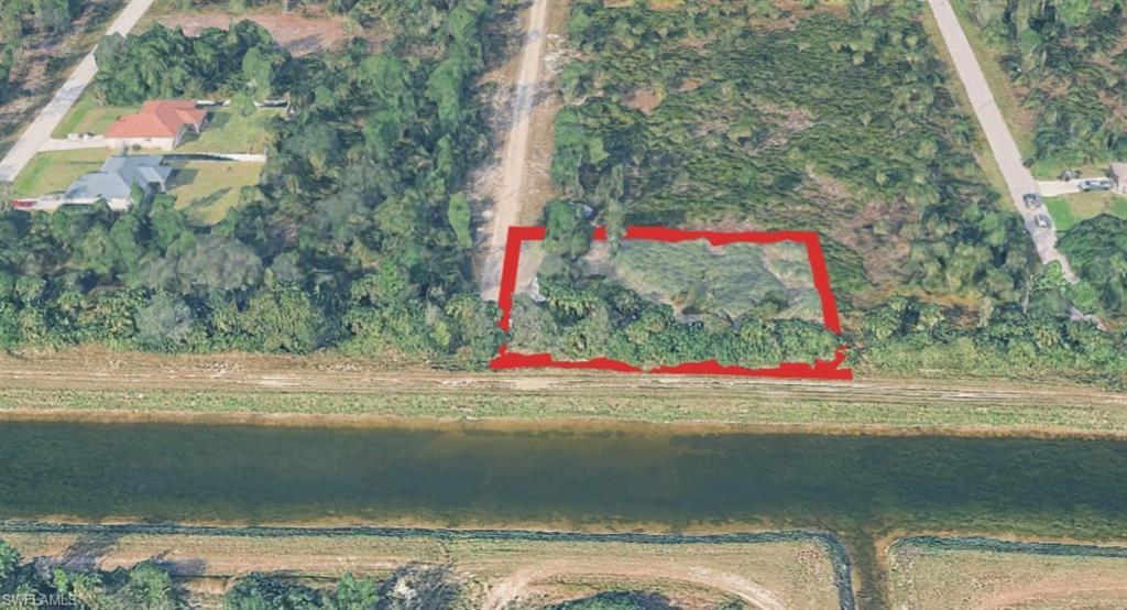 Prime Location!!! NO FLOOD ZONE UNDER 20K.  Large lot on a freshwater canal.  Act Fast, Quiet country living, this one won't last.  Bring your fishing poles while you build your dream home.