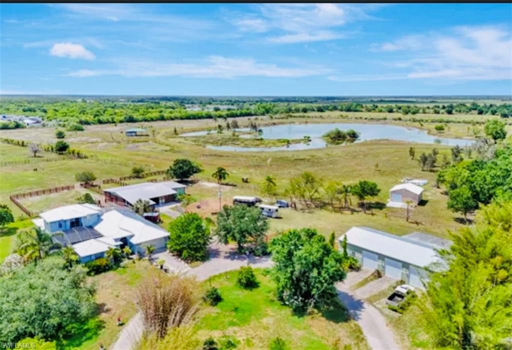EQUESTRIAN 50+ ACRES IS A RARE FIND IN LEE COUNTY WITH LARGE CBS HOME-2 BARNS-5 CAR GARAGE-SHOP
HORSE TRAILS & LARGE LAKE FOR CANOE OR KAYAKING- THIS LAND COULD BE SPLIT INTO- 5 (10 ACRE LOT SPLITS) OR KEEP ENTIRE PROPERTY FOR A FAMILY COMPOUND
HOME HAS METAL GALVALUME ROOF-JACUZZI & SWIMMING POOL-
BEAUTIFUL UPDATED KITCHEN WITH GRANITE TOPS-
FLORIDA ROOM -LARGE PRIMARY SUITE
2nd FLOOR VIEWING DECK IS A LONG VIEW ACROSS THE LAKE AND PASTURE
HORSES & CATTLE ARE ON THE LAND & AN APPOINTMENT IS A MUST.