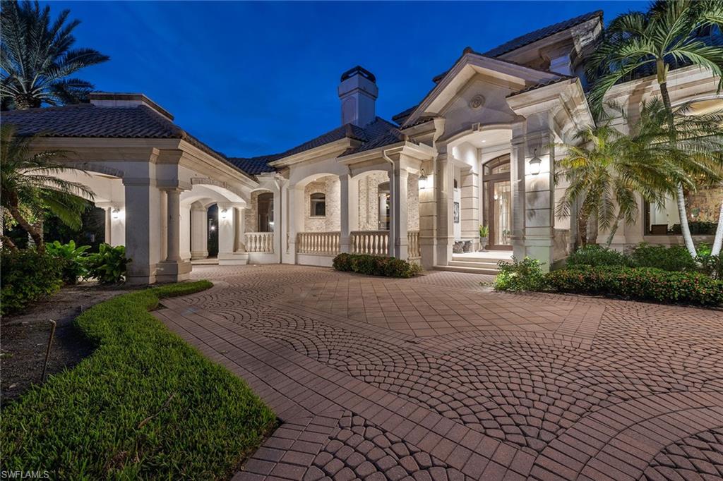 Rare, one-of-a-kind custom luxury home designed by award-winning professionals Richard Guzman, architect, Collins & Dupont, interior design, and Christian Buske, landscape-hardscape architect. This home was created to capture the magnificent vistas of the lake, golf course, and exclusive bird sanctuary monitored by the Audubon Society in the heart of Rookery Lake at Bonita Bay. This home features 5 bedrooms, 6.5 baths, den, a private elevator, 4 fireplaces, a home theater by Thomas Riley Artisans' Guild, a butler's pantry, a temperature-controlled wine cellar with over 250 bottle capacity. Oversized three-car garage to accommodate up to 6 cars for the car enthusiast. Chef’s kitchen with Wolf gas range, Sub-Zero refrigerator/freezer, Miele dishwasher, warming drawer and more. Brand new Generac generator. Additional special features are available upon request. Enjoy all that Bonita Bay has to offer with five championship golf courses, world-class tennis, pickleball, full-service marina, Serenity Spa and Salon, Technogym fitness center and 18 miles of hiking and biking trails within its natural surroundings.