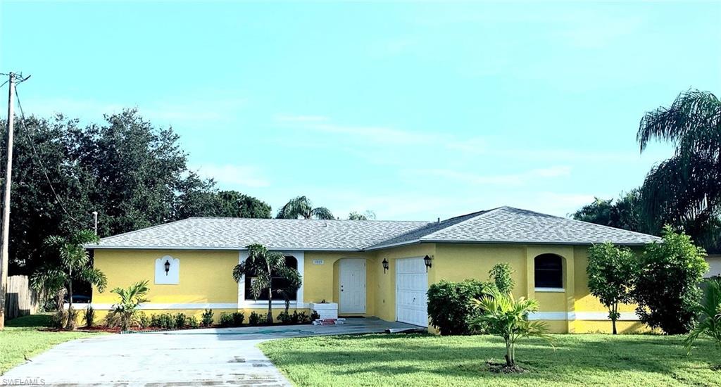 3-2-2 Single Family Home centrally located in close proximity to Super Wal-Mart.  
New Roof installed Sept 2020, New Air Conditioner 2020, New Garage Door Opener, 2019 Water Heater, New Carpet throughout the house, New Paint- Inside & Out, New Shower in the Master Bathroom and in the Guest Bathroom, New Light Fixtures, New Blinds throughout the house, Tree stumps were all grind down and Lanai was freshly carpeted with outdoor carpet and New Ceiling Fans with light kits in all the bedrooms.