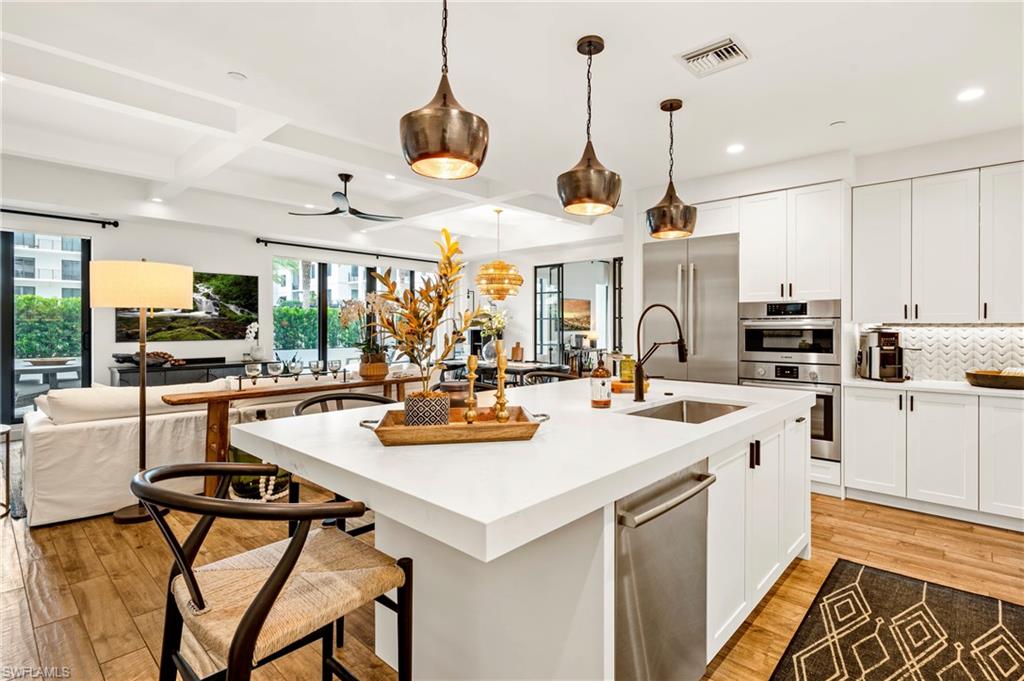 Experience the ultimate Naples lifestyle in this beautifully appointed three-bedroom plus den, 3.5 bathroom residence at the highly sought-after Eleven Eleven Central. With 2,466 square feet of interior living space and a host of upgrades, this home offers both style and comfort in a premier downtown location.

Situated on the coveted pool level, the condo has its own private gate leading directly to the amenity deck, allowing you to walk out of your home and dive straight into the sparkling resort-style pool. This unique feature provides the perfect blend of privacy and convenience, making it feel like your own private retreat while keeping you at the heart of the community. The home also includes two assigned parking spaces for added ease and an additional climate controlled storage space. 

Eleven Eleven Central is just three-quarters of a mile from the white sand beaches of the Gulf of Mexico, five blocks from the world-class dining and shopping of Fifth Avenue South, and only one block from Baker Park, a local favorite for its scenic walking and biking trails and waterfront location.

The community itself offers unmatched resort-style amenities. Residents enjoy a beach-entry pool with two 90-foot lap lanes and two hot tubs, as well as a state-of-the-art fitness center, a social room, a game room, and a private movie theater. A daily beach shuttle makes getting around town effortless. Just below the pool level, a lushly landscaped private park provides tranquil green space along with an off-leash dog park. The community also offers 6 on-site guest suites that owners can rent for overflow guests. 

Soon, the community will be welcoming Mr. 01 Pizza and Bad Ass Coffee right on site, adding even more convenience to this vibrant lifestyle.

This pool-level condo at Eleven Eleven Central is more than just a home—it’s an invitation to enjoy the best of Naples living, where luxury, comfort, and convenience all come together.