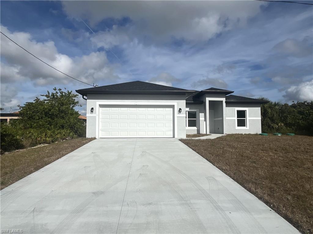 Step into this stunning new construction home in Lehigh Acres, FL! Featuring four generously sized bedrooms, the private primary suite offers a spacious tiled shower, dual vanities, and separate his-and-hers closets. The thoughtfully designed kitchen includes abundant cabinetry, a pantry, and a large peninsula island perfect for cooking and gathering. A versatile den provides the option for a fourth bedroom or home office. Elegant tile flooring runs throughout, complemented by wood shaker cabinets and stylish modern fixtures. The open great room leads to a spacious backyard through sliding glass doors, while oversized windows fill the home with natural light. Enjoy the convenience of an indoor laundry room with washer and dryer hookups and a two-car garage with opener and side access door. Relax or entertain on the expansive rear lanai with sliding door access. Pet-friendly and ideally located near SR 82 and all Lehigh Acres amenities! Photos may not be of actual unit- for marketing purposes only.