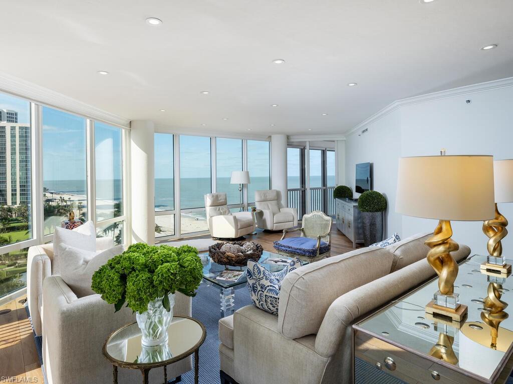 C10192 From Sunrise to sunset this highly desirable and rarely available unit in the 01 stack in the prestigious building Le Parc offers panoramic Gulf and Bay views. The beautiful entry foyer opens to the spacious great room featuring floor to ceiling glass, hardwood floors, a custom built-in wine storage and dining area. This unit has been artfully renovated with exceptional attention to detail.  With stunning direct Gulf views and balcony access, this great room provides an indoor and outdoor entertainment space. A focal point of the generous master suite is the extended Gulf views from the adjoining balcony. Family or friends will also enjoy the incredible Venetian Bay views from a second bedroom. Le Parc offers 24-hour security and a gated entrance for added security. Owners have the privilege to enjoy true luxury condominium amenities including a breathtaking beachfront pool and spa, a newly renovated fitness facility, sauna facilities, locker rooms, a Har-Tru tennis court, 2 guest suites, two under building parking spaces and a large social room with a catering kitchen. Boat docks are available to lease or purchase through the Venetian Bay Yacht Club.