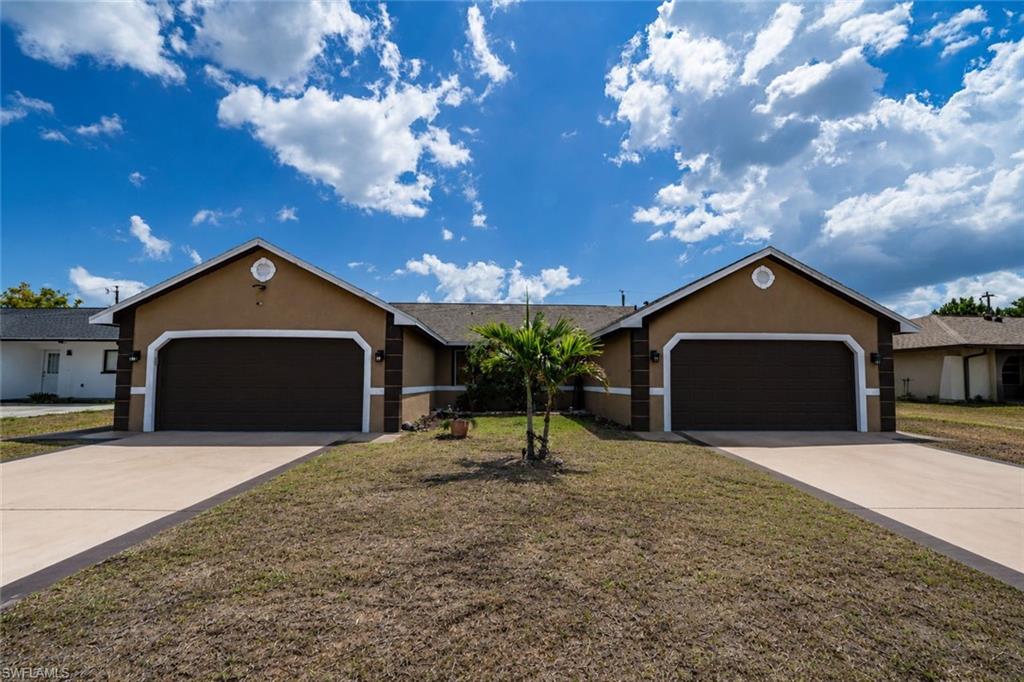 Spacious duplex located in the heart of Cape Coral close to hospitals, downtown, restaurants, shopping, and more. Property features updated kitchens, roof replaced in 2023, newer garage doors, fenced yard, patio area, attached 2-car garages on each side, and one newer water heater. Property offers flexibility and a great opportunity in a convenient location.