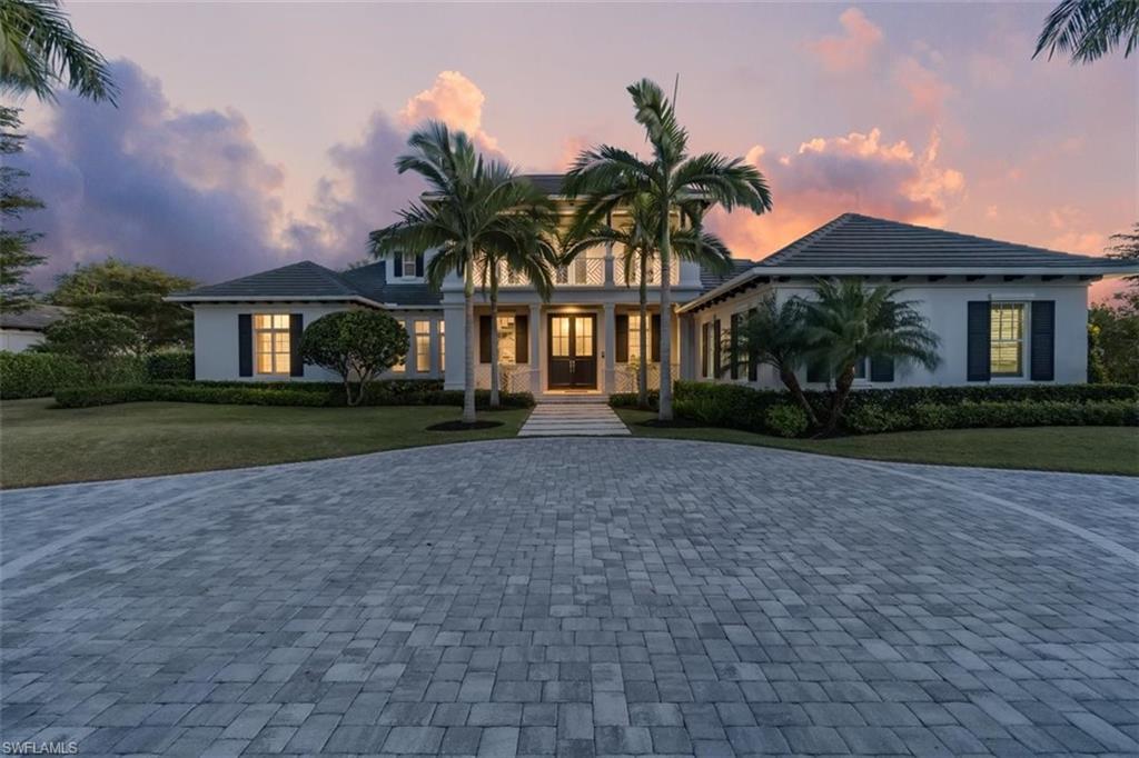 H1924 - Gorgeous Magnolia floor plan by Diamond Custom Homes featuring beautiful tropical architecture appointments throughout with stunning wood floors, great room w open kitchen offering wet bar and breakfast nook. 4193 sq feet on the main floor with a perfect 2nd floor retreat of guest rooms, loft with flex room and open veranda overlooking the 2nd fairway of The Lakes GC. The private guest suite on the first floor is an ideal oasis for your overnight company. Amazing outdoor living with kitchen, and abundant under cover seating area overlooking the lovely generous pool, integrated spa and firepit! Southern exposure and superior location make this the perfect full time residence or Seasonal home.