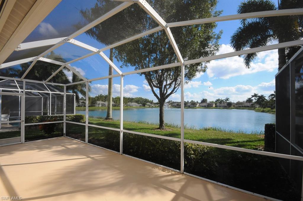 Beautiful full lake view from the immaculate villa in the quiet community of Villas of Greenwood Lakes.  Carpet in main living area and bedrooms with tile in kitchen and bathrooms.  Relax in the spacious living room and look out over the lake with its sparkling fountain.  This home is turnkey furnished.  Everything you need to start enjoying the fabulous Naples lifestyle; just bring food and clothes after closing!  The screened extended lanai has a southern exposure to enjoy the sunny winter days.  Upgraded washer and dryer included in purchase price.  This community is located on Rattlesnake Hammock just a short drive to downtown Naples and restaurants and not far from the beaches and restaurants on Marco Island.  Everything has been done for you down to the cleaning!  You have to see this one and start enjoying your Naples experience as soon as possible.