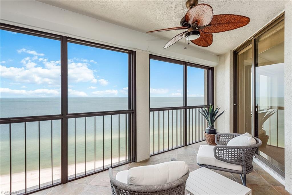 High-floor designer residence with gorgeous Gulf and sunset sky views! This spacious three-bedroom plus den, three-bath features a large Gulf-facing screened-in lanai with hurricane shutter protection perfect for outdoor dining. This highly desirable floor plan welcomes you into an elegant entry foyer and spacious living area boasting tasteful wood flooring, elegant moldings, lighting and trim and a separate dining area. The updated open kitchen and breakfast area offer plenty of room for entertaining family and guests, including two full guest bedrooms, both with stylish full bathrooms. The Carlysle has an updated lobby and has completed its elevator hallway renovations. Bay Colony residents enjoy the use of their own private beach club and restaurant, a tennis club, as well as the use of the amenities of Pelican Bay. Private golf memberships are available separately.