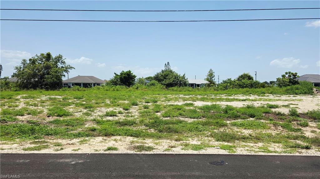 Cape Coral Canal-Front Vacant Lot – Perfect for a Future Vacation Home Discover the ideal setting for your dream vacation home  or to invest, Conveniently located near shopping, dining, parks, golf, and a short drive to downtown Cape Coral, Fort Myers and beaches. WATER AND SEWER AVAILABLE!!
Lot next  1402 also for sale!!