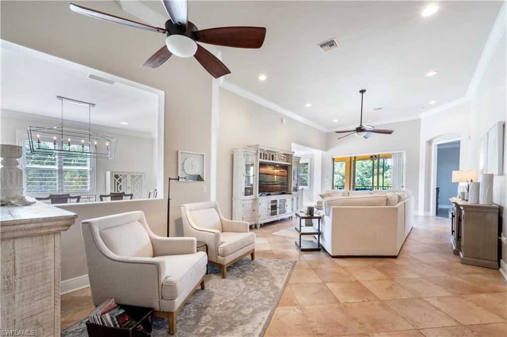 Waterfront end unit Penthouse-JUST LISTED with a FULL GOLF MEMBERSHIP INCLUDED--- Take advantage of a top bundled community & enjoy a full golf membership with all the newly added AND renovated amenities. Immaculate top floor corner Penthouse with soaring 12' ceilings to include crown molding, additional windows throughout since this is an end unit, top line neutral furnishings that are negotiable, tile flooring, bright kitchen featuring granite countertops, stainless appliances, light custom kitchen cabinets with glass fronts, Plantation shutters, additional recessed lighting, rich wood & wrought iron staircase with garage & front entry access, formal dining room or a family room PLUS... An oversize master bedroom with plenty of room for a large sitting area AND a desk & showcasing rich wood flooring, a custom walk-in closet & split Plantation shutters.  Master bath features both a soaking tub & separate walk-in shower, dual sinks in separate marble countertops & a private water closet.  Even the 3rd bedroom is spacious enough to house twin beds and a desk area with book shelves, tile flooring, crown molding, custom paint plus a wall mounted TV!   Big water, Palm tree & fountain views from your screened balcony with ceiling fans.  , easy access to golf, Tennis, casual and fine dining plus plenty of outdoor dining & entertainment options. Toscana offers a private community pool and spa plus you have access to the master pool & spa just at the end of your street! Great reciprocal opportunities from May to October.  WITH FULL GOLF AT VASARI GOLF & COUNTRY CLUB!!