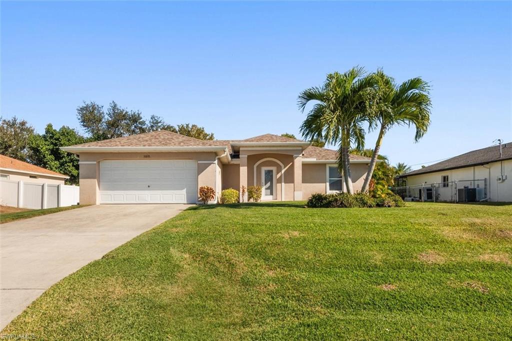 No flood insurance and all assessments are paid! This move-in-ready pool home in Cape Coral features high ceilings and a bright, open feel! This well-maintained property features durable LVT flooring and a stylish kitchen with granite counters, stainless appliances, and a marble backsplash. This home features a split-bedroom floor plan.  The spacious primary suite featuring crown molding, a walk-in closet, and upgraded bathroom with modern tile, dual sinks, and a walk-in shower. Two additional bedrooms and a convenient pool bath—also upgraded—offer flexibility for guests or family. Enjoy your private outdoor space with newer St. Augustine sod, updated irrigation, and a heated pool with sun shelf and water feature—fully enclosed with a pool cage and brand-new screens. Paver deck and covered lanai make outdoor living easy. Extras include a Kevlar Storm Smart hurricane screen protecting the lanai area. Many updates include newer roof, hot water tank, Kevlar screen, pool screens, irrigation system, granite counters, flooring, and more! Contents are negotiable.  Average monthly utility expenses are: electric $125, water $65,  trash is covered in your taxes.