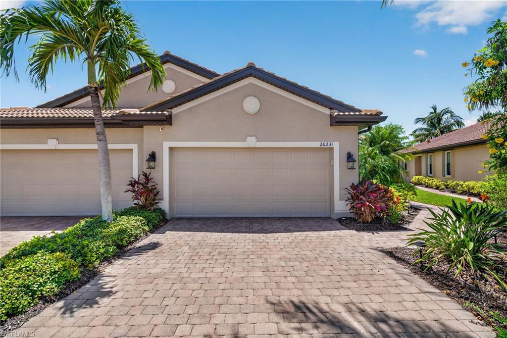 Welcome to effortless Florida living in the highly sought-after community of Paloma in the heart of Bonita Springs. This beautifully maintained 2-bedroom + den, 2-bath residence with a 2-car garage offers the perfect combination of comfort, style, and peace of mind, all while overlooking a tranquil lake.  Designed with flexibility in mind, the spacious den features a custom twin Murphy bed, making it an ideal space for overnight guests, a home office, or a hobby room. The open-concept floor plan is perfect for both everyday living and entertaining, with abundant natural light creating a warm and inviting atmosphere.  This home has been thoughtfully updated with numerous recent improvements, including hurricane impact windows installed in 2022 for enhanced storm protection, a full suite of luxury LG appliances added in 2024, new bedroom carpeting in 2025, and a new HVAC system installed in 2026, allowing you to move in with confidence and enjoy years of worry-free ownership.  Residents of Paloma enjoy an exceptional lifestyle with resort-style amenities including a beautiful clubhouse, fitness center, resort pool, tennis and bocce courts, and sidewalks throughout the community. Ideally located just minutes from world-class Gulf beaches, Coconut Point Mall, The Promenade at Bonita Bay, RSW International Airport, championship golf, dining, and entertainment, this home places the very best of Southwest Florida at your doorstep.  Whether you're searching for a full-time residence or a seasonal retreat, this exceptional home offers the perfect blend of modern updates, desirable amenities, and an unbeatable Bonita Springs location.