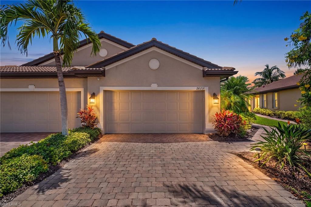Welcome to effortless Florida living in the highly sought-after community of Paloma in the heart of Bonita Springs. This beautifully maintained 2-bedroom + den, 2-bath residence with a 2-car garage offers the perfect combination of comfort, style, and peace of mind, all while overlooking a tranquil lake.  Designed with flexibility in mind, the spacious den features a custom twin Murphy bed, making it an ideal space for overnight guests, a home office, or a hobby room. The open-concept floor plan is perfect for both everyday living and entertaining, with abundant natural light creating a warm and inviting atmosphere.  This home has been thoughtfully updated with numerous recent improvements, including hurricane impact windows installed in 2022 for enhanced storm protection, a full suite of luxury LG appliances added in 2024, new bedroom carpeting in 2025, and a new HVAC system installed in 2026, allowing you to move in with confidence and enjoy years of worry-free ownership.  Residents of Paloma enjoy an exceptional lifestyle with resort-style amenities including a beautiful clubhouse, fitness center, resort pool, tennis and bocce courts, and sidewalks throughout the community. Ideally located just minutes from world-class Gulf beaches, Coconut Point Mall, The Promenade at Bonita Bay, RSW International Airport, championship golf, dining, and entertainment, this home places the very best of Southwest Florida at your doorstep.  Whether you're searching for a full-time residence or a seasonal retreat, this exceptional home offers the perfect blend of modern updates, desirable amenities, and an unbeatable Bonita Springs location.