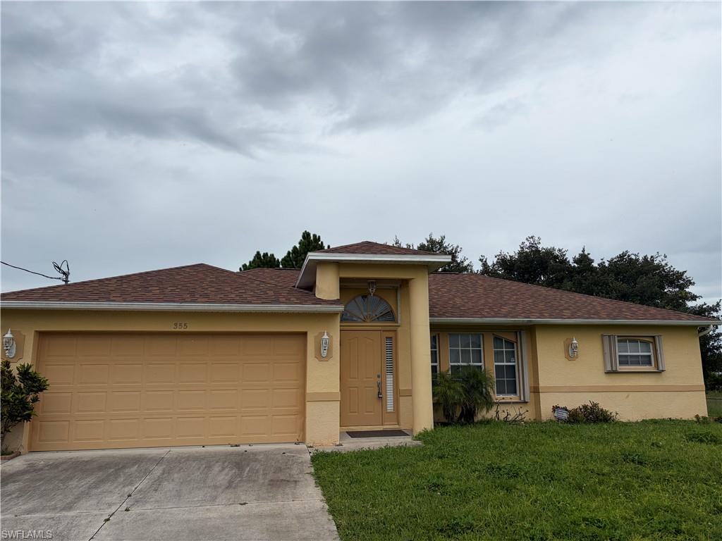 Beautifully maintained house with 3 bedrooms and 2 bath rooms with a 2 car garage in the heart of Lehigh Acres. New roof 2 years ago also AC and water system are 2 years old. Fully fenced yard with mature trees for shade in the back yard. New kitchen cabinets with stainless appliances and granite countertops. Hot water heater was just replaced in garage. Great patio off the living room to enjoy Florida. House has sliding storm shutters on windows and doors for fantastic storm protection. Schedule your showing today and don’t miss this excellent opportunity.