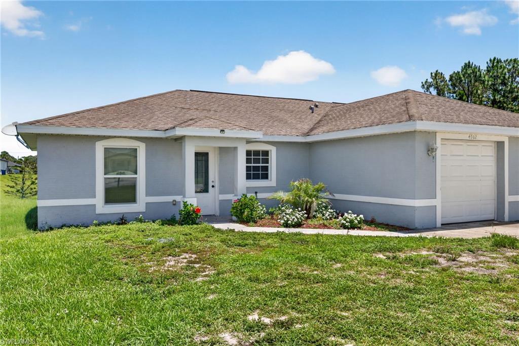 A fantastic income producing property in a great location of Lehigh Acres. Each unit consists of 3 bedrooms, 2 bathrooms, 1 car garage, 2 lanai's, and a bonus storage room on the right side. The extra long driveway is plenty of space for multiple tenants. Each unit is open concept & a split floor plan, with a large screened in lanai on each side making a great home for the outdoor living everyone is looking for in Florida. This duplex is perfect to live in one side & rent out the other side to cover the mortgage, or rent out both units and make more money! The location is perfect, close to Ft. Myers. Near shopping, dining, and about a 30 minute drive to the best beaches in southwest Florida! Schedule your showing today.