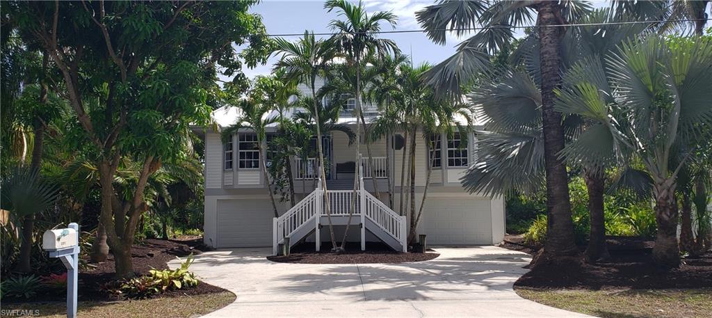 Beautiful Palm Isles. This Waterfront Home with Direct Deep Water Access to the Gulf of Mexico is a hidden Treasure. The home has 3 bedrooms and 2 baths with loft. Great Room with French Doors to second level deck overlooking Pool, Dock And Preserve. Spacious Updated Kitchen with Granite and White Cabinets. Huge Dining Room with Vaulted 20' ceilings. Third Level Balcony off Master Bedroom and Bath. The Home has many updates within the past few years. New Metal Roof, New AC System. All New Composite Decking on Dock, Balconies,Front Stairway with New Handrails. Totally Remodeled Master Bath and Guest Bath. New Tile. Hardwood Floors in Main Living areas Carpet in Bedrooms. The Pool was Resurfaced with Pebble Crete. All This in a Gated Community just minutes from The beaches by Boat or Car. Wine coolers in Laundry room do not convey.
