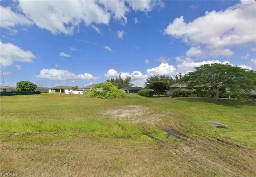 Shovel-ready lot with approved permits and site plans, ready to build. Save at least 4 months of paperwork time with this lot. Construction plans are available upon request. The seller is offering three other lots in the same condition and location at the same listing price. Take advantage of the opportunity to build your dream home on this beautiful NW Cape Coral lot. With Eastern exposure, you'll enjoy fabulous sunrises in a fast-growing area surrounded by new construction homes. The location is ideal, close to supermarkets, shopping, schools, golf courses, the city boat ramp (providing access to the Gulf of Mexico), and Pine Island (Matlacha). Don’t miss your chance to live in paradise!