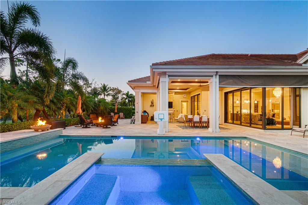 Magnificent home situated on a premier golf course lot in Naples’ coveted Quail West community! FULL GOLF MEMBERSHIP AVAILABLE NOW (SKIP THE WAITLIST AND SAVE $180K)! *Beach Club Membership also available!* Located on a lushly landscaped lot for privacy. Offers prime Western exposure for breathtaking sunsets from your backyard oasis. Expansive patio is perfect for entertaining or relaxing, offering a pool/spa with a tanning shelf, ample space for lounging, an outdoor shower, electric lanai screens, 3 fire pits, a fireplace & a summer kitchen with marble counters, a grill, sink, mini fridge & bar seating. This 4 bed + den/4 bath home is finely appointed with custom coffered ceilings, marble & wood flooring, whole-house generator, elegant rotunda dining room, Sonos sound system, large 3-car garage with room for golf carts & hurricane impact windows/doors. An entertainer’s dream with Zero corner sliders in the living room for a seamless indoor and outdoor experience. Stunning chef’s kitchen features granite & quartz counters, white custom cabinetry, glass mosaic backsplash, walk-in pantry & high-end stainless-steel appliances. Spacious primary bedroom boasts private entry to the lanai, dual closets & spa-like bathroom with dual vanities, freestanding tub & custom marble walk-in shower with multiple shower heads. Quail West is a coveted community with two spectacular golf courses, 100,000 sq ft masterfully renovated clubhouse, Racquet Sports complex, indoor lagoon-style Junior Olympic-sized pool, ample dining & social options, state-of-the-art fitness facility with classes available, a full-service salon & spa with sauna & more. Located minutes to Barefoot Beach & nearby Mercato, Waterside Shops & Naples 5th Avenue with easy access to RSW & Naples Airports.
