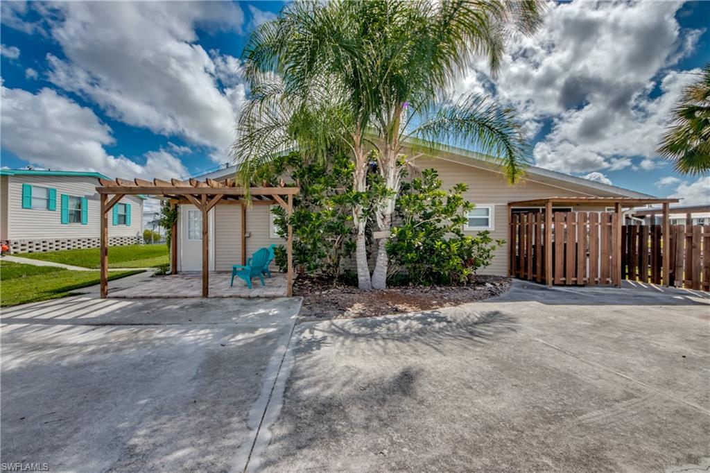 Looking for the perfect Florida winter home? Look no further! This hidden gem on Pine Island is perfect for those that love the outdoors. Gulf Access 3 bedroom 2 bath home is being offered turnkey. All you need to bring is your personal belongings. This place is meant to entertain and currently a successful vacation rental. Gulf access property with a private boat lift and only 8 minutes to Redfish Pass and all the gulf has to offer. Recently updated inside with plenty of space. Huge covered lanai with an outdoor kitchen to enjoy our beautiful sunsets right from your backyard. Boat ramp is shared. There is a voluntary HOA fee of $125 per year that lets you use the pool, and boat ramp. There are dates booked out that would need to be honored.