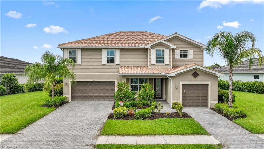 Welcome to this spacious Sorrento floor plan in the highly sought-after community of Orange Blossom Ranch in Naples. Situated on an oversized pie-shaped estate lot, this exceptional property offers additional privacy, expanded outdoor living space, and beautiful lake views. With 5 bedrooms, 4.5 bathrooms, a versatile loft, and a three-car split garage, this home provides plenty of room for both everyday living and entertaining. The open-concept design features plank tile flooring throughout the main living areas and comfortable carpeting in the bedrooms. The beautifully appointed kitchen showcases granite countertops, white cabinetry, stainless steel appliances, a large pantry, breakfast bar, eat-in dining area, recessed lighting, and stylish pendant lights over the bar. Expansive sliding glass doors from both the kitchen and great room fill the home with natural light and open to the screened lanai, where you'll enjoy peaceful lake views, a sparkling pool and spa, and an outdoor kitchen with bar seating—perfect for enjoying Southwest Florida's outdoor lifestyle.

The first floor offers soaring vaulted ceilings in the great room, a formal living room, and a private guest suite with an ensuite bath, ideal for visitors or multigenerational living. Upstairs, a spacious loft provides additional living space, while the primary suite serves as a relaxing retreat with walk-in closets and a luxurious bath featuring a large walk-in shower, dual vanities with granite countertops, and a private water closet. Three additional bedrooms and two full bathrooms complete the second floor, providing flexibility for family, guests, or a home office.

Residents of Orange Blossom Ranch enjoy an impressive array of resort-style amenities, including resort and lap pools, a spa, fitness center, tennis and basketball courts, sand volleyball, playgrounds, fishing piers, and a clubhouse with year-round social activities. Conveniently located in Northeast Naples, the community offers easy access to shopping, dining, golf courses, and top-rated schools, while being just a short drive from Naples' world-famous beaches, entertainment, and cultural attractions. Combining generous living space, outstanding amenities, and one of the community's larger estate-sized lots, this home presents an exceptional opportunity to enjoy the best of Southwest Florida living.