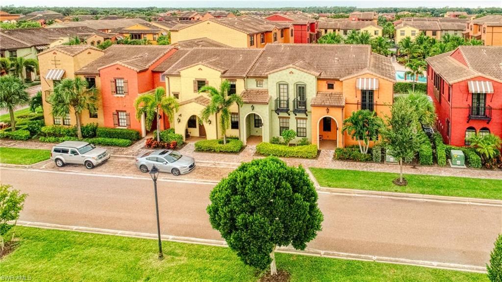 Southwest Florida living in style! This end unit boasts lake views from the front and pool to the back. Located in the beautiful and award winning PASEO community. PASEO includes a movie theatre, tennis, pickle ball, volleyball courts. Fitness Center and Spa. Restaurants, ice cream parlor, cafe and library. 
This unit features granite counter tops and stainless steel appliances in the kitchen with a walk-in pantry! Spacious living area. Office Nook separating the Master Bedroom from the guest bedrooms.
Close to I75, RSW airport,Gulf coast town Center, Miromar and Coconut Point shopping centers, as well as Red Sox and Minnesota Twins spring training facilities.