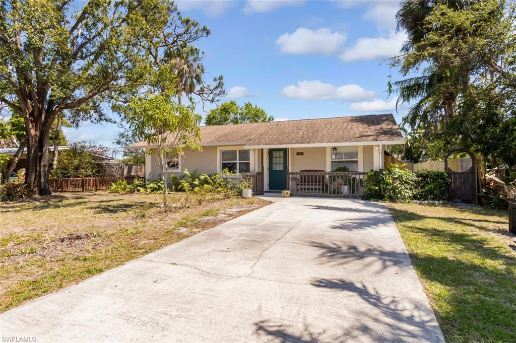 Looking for a savings on your electric bill?  2019 - Solar powered panels installed, saves on your electric cost, ranges from $30 to $90/month! No HOA Fees! Adorable home, 3 bedrooms, 2 baths open, living/kitchen area.  Private, fenced back yard, large patio, firepit, exterior building currently used as an office and workshop.  Located close to the beaches, dining, restaurants and shopping.  Range with double ovens, Miele dishwasher 2020, Whirlpool refrigerator in 2020.  Many fruit trees -Banana, Meyer Lemon, Lime, Surinam Cherry, Mango, Mulberry, and Pineapple. Current Survey and elevation certificate available.  No flooding in the main house, little water intrusion in Master Bedroom addition, about 1/4 inch but remediated immediately and very little damage from Hurricane Ian.  Living area has been freshly painted.