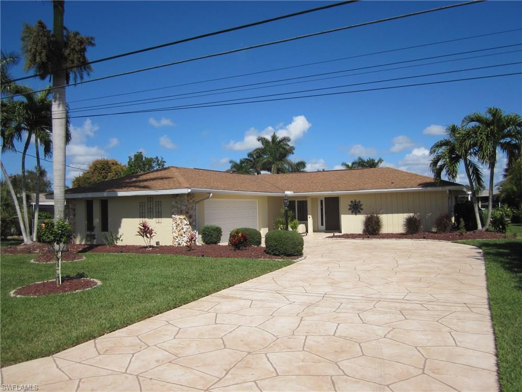 DO NOT MISS THIS STUNNING, FULLY REMODELED, POOL HOME WITH DIRECT GULF ACCESS!!...3 bed 2.5 bath with granite counters, stainless appliances, new tile, base, pocketing sliders, tiki hut, boat lift, just to name a few....almost 2000sf and side load garage....NEW POOL AND SPA....new windows, composite dock and boat lift...FULLY FURNISHED...just bring your toothbrush!!...this home is only a matter of minutes out to the river with NO bridges, locks, lifts or power lines....walking distance to the Yacht Club and Boathouse restaurant, tennis and launch ramp....One of the most desirable areas in the Cape, by boat, by bicycle and walking......get your piece of paradise NOW without the time to remodel!!..make your appointment today!!!