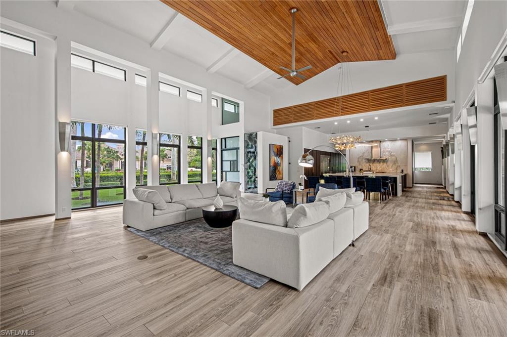 Renovated with a contemporary twist in 2021, this 1-of-a-kind midcentury modern stunning estate was designed by renowned architect Andrea Clark Brown. The home is newly furnished and is offered with a FULLY TRANSFERABLE GOLF MEMBERSHIP. From the front door’s impressive glass wine cellar, floor-to-ceiling pivot doors, Koi fishpond, & spacious owner’s suite complete with a steam sauna the unique features are endless. This floorplan was crafted to deliver an open-air style of living. The walls of picture windows allow light to flood the home & views of the earthly landscape inside. The expansive breezeway, outdoor covered living and kitchen area, pool, sundeck, and private backyard with western exposure offer unparalleled outdoor living. The chef’s kitchen features new SubZero appliances, separate ice maker, double islands, wine bottle chiller, & prep kitchen. The casita is a guest’s oasis offering a private VIP suite, living room, & kitchen. Situated on over an acre of land in the premier community of Quail West. Bonus features: soaring ceilings, 2.5 garages raised for the addition of lifts, custom AV, security throughout, roof 2016 *Casita bedroom virtually staged