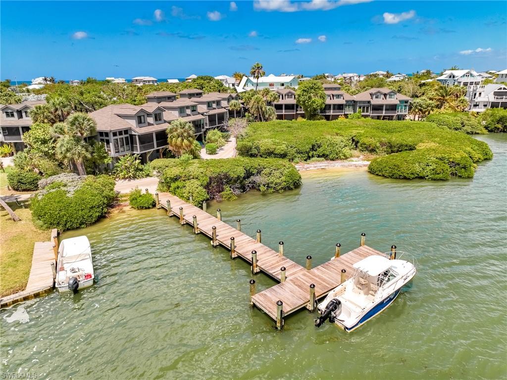 End Unit With Harbor Views & Dock Access! Experience the tropical island waterfront lifestyle! This value-priced townhome offers shared dockage for your boat, and an unbeatable location just steps from the dockage, ferry landing, and club restaurant… because sometimes the outside is doing all the heavy lifting. 
Let’s be clear: the interior is authentically, unapologetically vintage. We’re talking original finishes, original fixtures, and décor. The kitchen and baths? Classic. The vibe? Beach Retro. The opportunity? Endless.
But here’s the thing—this townhome is livable, functional, and ready for its next chapter. Whether you’re dreaming of a full renovation, a creative reimagining, or simply embracing the throwback charm (we won’t judge), this is your chance to start with a light-and-airy plan in an even better location.
And what a location it is—end unit, harbor views, steps to dockage and kayak beach... and just a short distance to everything Safety Harbor Club has to offer. Enjoy access to a heated pool, tennis and pickleball courts, clubhouse dining, and private Gulf beach access where the sunsets are always in style (no renovation required).
Bring your vision. Bring your contractor. Or bring your love for 1985. Either way, this is your chance to secure a waterfront foothold in an end unit at a price that leaves room for transformation.
Don’t miss this unique before-and-after opportunity.