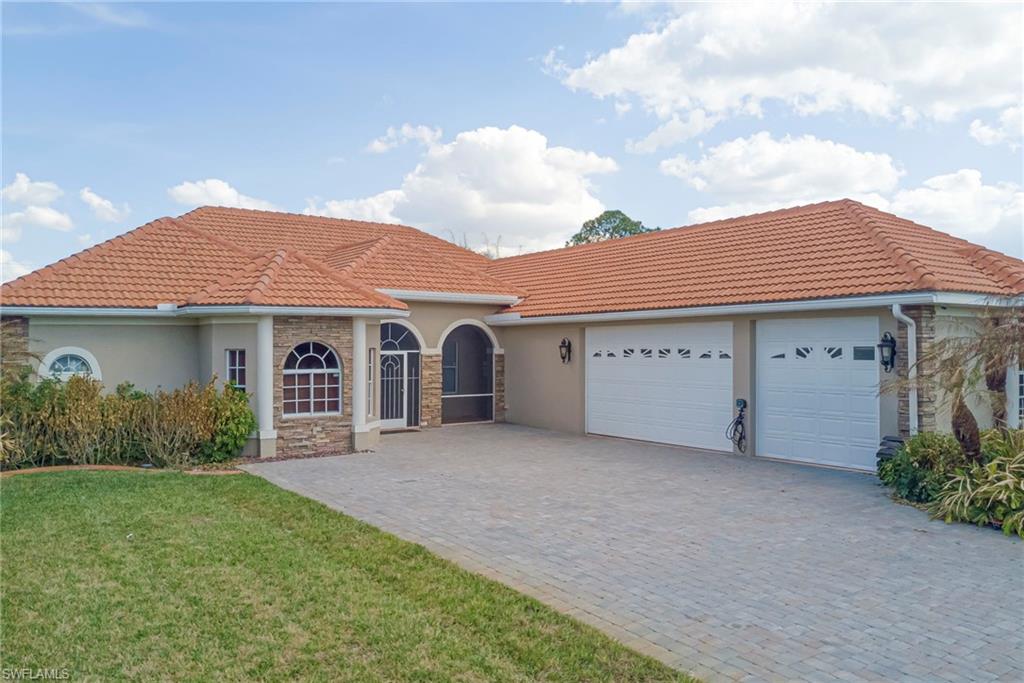 Spacious and beautifully upgraded, this 5-bedroom, 3-bathroom home in Lehigh Acres, Florida offers exceptional comfort and style with abundant natural daylight throughout. The chef’s kitchen features a large island, stainless steel appliances, and elegant finishes, complemented by luxury laminate flooring and crown molding. The home is equipped with a whole-house RO water system, spa-like bathrooms, and a full outdoor security system for added peace of mind. A 9x12 reinforced safe room provides an additional level of security and functionality.
Step outside to your private backyard oasis featuring an enclosed, heated pool and spa, a tranquil pond, gazebo, basketball court, fruit trees, and a storage shed—perfect for entertaining and relaxation.
Additional highlights include a 3-car garage, durable clay tile roof, paver driveway and walkways, and a newer A/C system installed in 2021.
Located near new schools, beautiful beaches, restaurants, shopping, and outdoor adventures, this home offers the ultimate Florida lifestyle.
Call today to schedule your private showing!