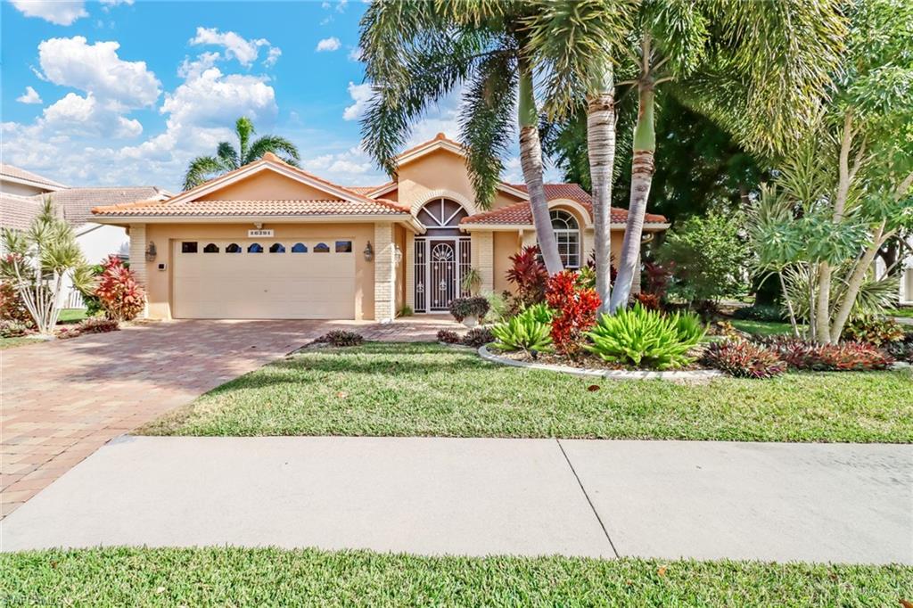 Welcome to Kelly Greens Country Club. This stunning pool home offers 3 bedrooms, 3 bathrooms, and over 1900 square feet of open concept living space. With updates throughout entire home including granite counters, new cabinets and new tile / vinyl planking flooring. One of the only homes in Kelly Greens having a full bathroom with granite on the lanai. This home has a brand new pool cage, solar panels, pool equipment and includes a brand new pool heater. It is prepared for hurricane season with a set of new kevlar hurricane shutters.  Enjoy the amazing views of the golf course from your lanai. Kelly Greens is one of the most prestigious and well taken care of country clubs in Southwest Florida. There is a championship golf course 18 holes designed by architect Gordon Lewis. The recent four million dollar renovation includes tournament level tennis courts, a beautiful 200 seat full service restaurant, community fitness center, pool, snack bar and lounge. Do not miss out on this one of a kind community located in one of the most desirable areas of Fort Myers just minutes from Sanibel Island and Fort Myers Beach. It is impossible to find a better location.