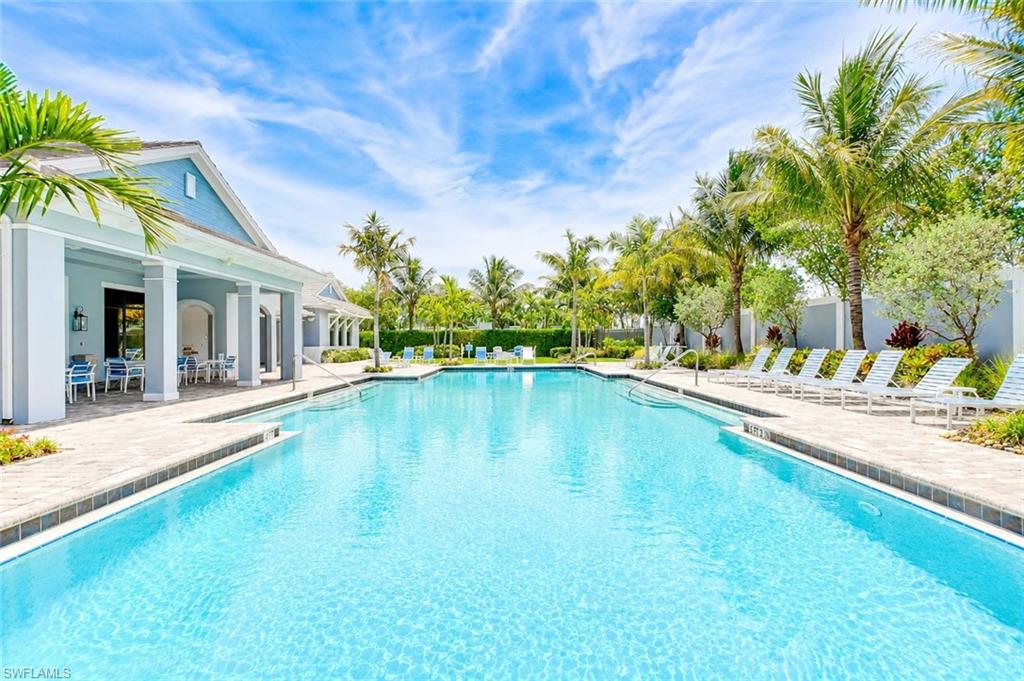 One or more photo(s) has been virtually staged, AI generated or rendered.  One or more photo(s) has been virtually staged, AI generated, or rendered.
MOVE-IN NOW, NO FURNITURE SHOPPING NECESSARY. Welcome to 2620 Seychelles Circle #1302, a beautifully appointed turnkey-furnished residence in the desirable Seychelles community of Naples. Featuring the highly sought-after and convenient Kendal floor plan, this first-floor unit offers effortless living with a bright, open-concept design and an exceptional blend of modern coastal style and thoughtful custom upgrades throughout.
The stunning kitchen serves as the heart of the home, showcasing quartz countertops, stainless steel appliances, white shaker cabinetry, a spacious center island with seating, and elegant custom designer light fixtures. A striking custom accent wall, complemented by a matching custom accent detail beneath the kitchen island, adds warmth, character, and a sophisticated designer touch to the living space.
Offered fully furnished with carefully selected custom furnishings from Arhaus, this move-in-ready residence provides an effortless luxury lifestyle from day one. Brand-new luxury Berber carpeting with upgraded padding enhances comfort in the bedrooms, while abundant natural light fills the interior, creating a bright and inviting atmosphere. Large sliding glass doors seamlessly connect the indoor and outdoor living spaces, allowing you to enjoy Naples' beautiful year-round climate.
Located just minutes from Naples' renowned white-sand beaches, downtown Naples, Fifth Avenue South, Third Street South, premier shopping, dining, and entertainment, Seychelles offers residents an exceptional resort-style lifestyle with amenities that include a community pool, clubhouse, fitness center, and beautifully landscaped grounds.
Adding to the area's appeal, a future upscale retail center planned along Santa Barbara Boulevard is expected to feature a Whole Foods Market along with additional high-end shopping and dining destinations, further enhancing the convenience and long-term desirability of this sought-after location.
Combining designer upgrades, premium furnishings, the convenience of first-floor living, and true move-in-ready ease, this residence represents one of the finest opportunities currently available in Seychelles. For buyers seeking exceptional value without compromising on quality, style, or location, 2620 Seychelles Circle #1302 stands apart as a compelling offering that is not to be missed.