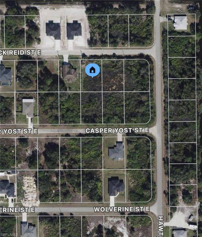 Vacant lot on paved road with power pole at the curb. Next to newly built homes. Great neighborhood close to SR82 and East Lehigh High School. Perfect to build on or develop. Hablo Español!!
