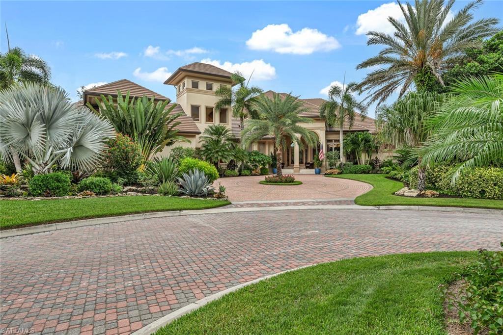 One-of-a-kind home with Guest House in the exclusive Quail West Golf community. This magnificent custom-built home is perfectly situated on a large sought-after cul-de-sac homesite with tranquil preserve views. This unique main home features 4 bedrooms and 4 1/2 baths, marble flooring, formal living room and dining room, library and soaring ceilings.The primary suite has separate sitting area, morning kitchen, double vanities, walk in shower and walls of glass bringing in plenty of sunshine. The gourmet chef will enjoy the large kitchen with center island, gas stove and separate dinette area. Great room has floor to ceiling sliding doors leading to the oversized lushly landscaped lanai with outdoor kitchen and 50 ft newly designed pool and spa. The guest house has 2,941 sq ft of living area with eat-in kitchen, 2 bedrooms with full baths, billiard room, theatre, library/office and large private roof top deck. This home has newer tile roof 5 a/c units and 5 garages with epoxy floors. Quail West offers a challenging Arthur Hill 36 hole course, recently remodeled 100,000 sq ft clubhouse, sports bar, fine dining, world class spa plus 12,000 ft of fully equipped fitness center. This home is being offered with a $70,000 social membership included. Golf membership is optional.Must see this magnificent home and all that it offers to appreciate